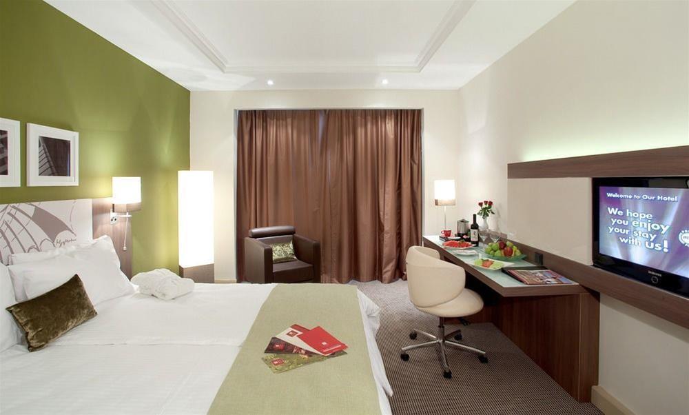 Leonardo City Tower Hotel Tel Aviv Giv'atayim Εξωτερικό φωτογραφία A typical room at the hotel